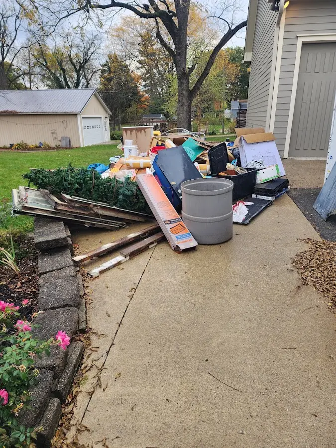 Dumpster being loaded with debris for 30 Yard Dumpster Rental in North Beaver